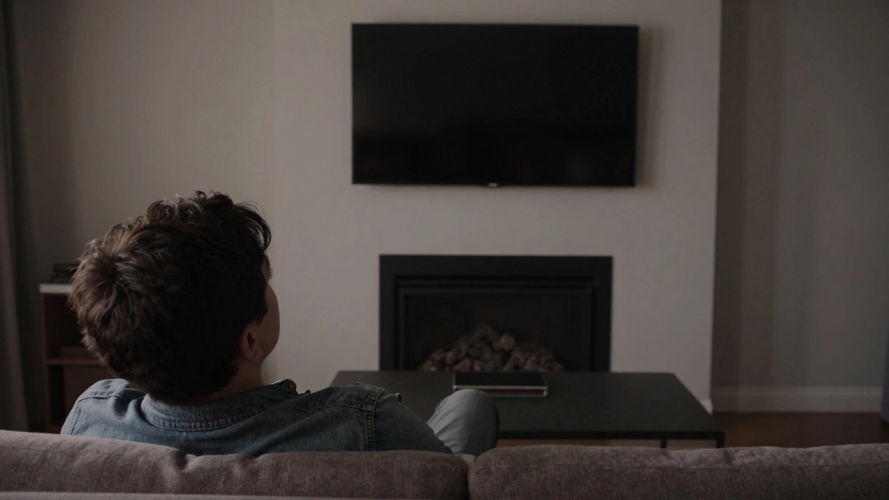 Person straining to view a TV mounted too high above a fireplace, coffee table blocking bottom of screen.